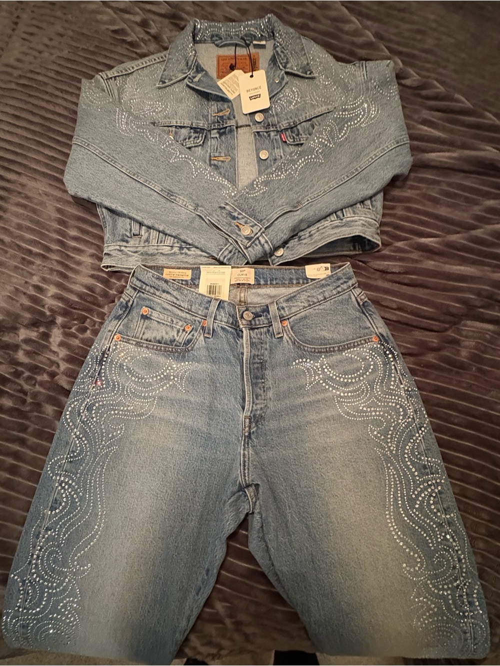 Levi's Light Blue High-Rise Jeans with Rhinestone Swirl Embellishment